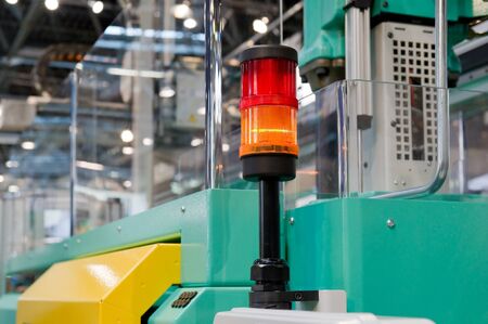 Warning light on a processing machineの写真素材