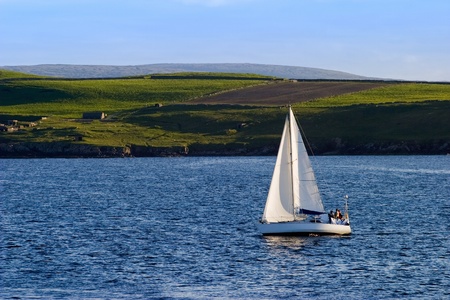 Sailboat at the beatiful coastlineの写真素材