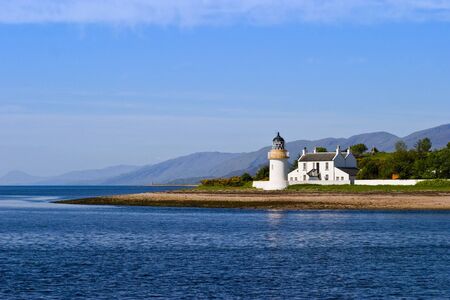 Lighthouse at a beautiful coastlineの写真素材