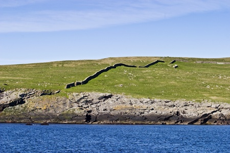 Stonewall landscape at the coastlineの写真素材