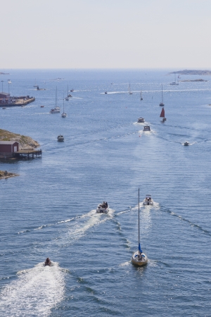 Boats in the channel on the way out to seaの写真素材