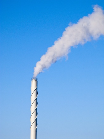 Dirty smoke from a high chimneyの写真素材
