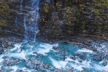 Glacier river with turquoise waterの写真素材