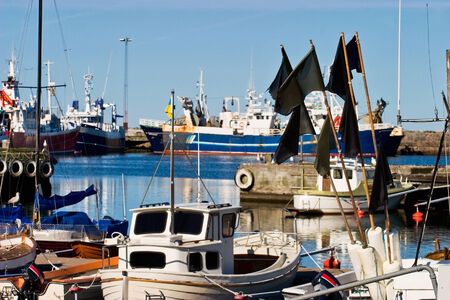 Fishing boats in the harbourの写真素材