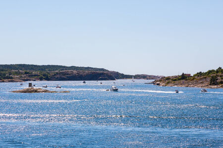 Pleasure boats in the rocky archipelagoの写真素材