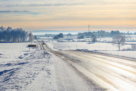 Winter road in countryside landscapeの写真素材