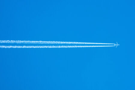 Airplane in the blue sky