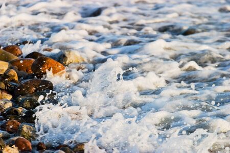 Beach waves on a rocky coast