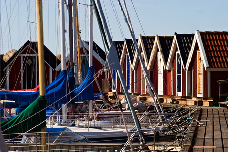 Boathouse and a jetty in the marinaの写真素材