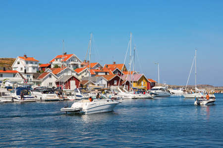 Boats in the harbor on the coastal village on the Swedish west coastのeditorial素材