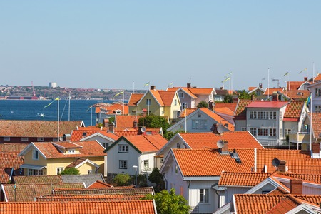 View of rooftops in a coastal settlement on the Swedish west coastの写真素材