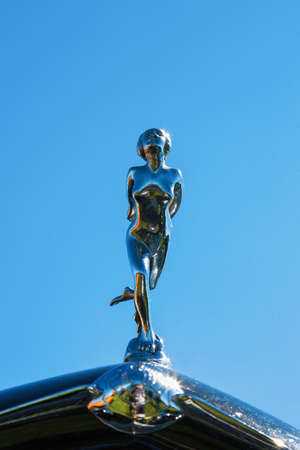Hood ornament of a woman on a classic carの写真素材