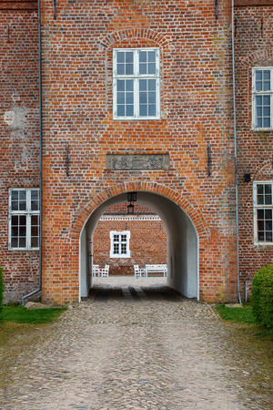 Entrance through an archway into a castleのeditorial素材