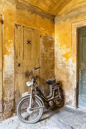 Moped in an old garageの写真素材