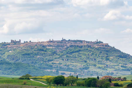 Village of Montalcino on a hill in Italyの写真素材