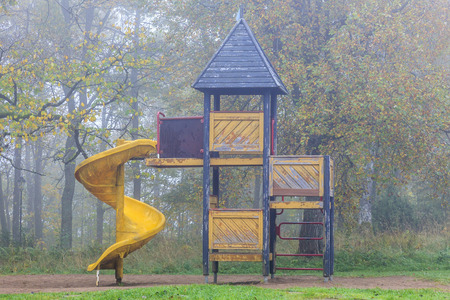 Morning fog at an empty playground