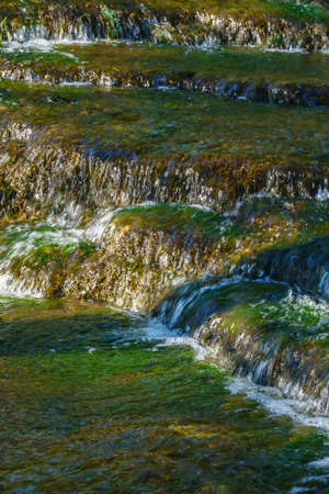 Streaming water in a streamの写真素材