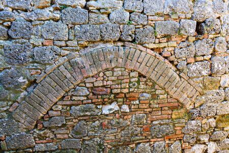 Bricked archway in a wallの写真素材