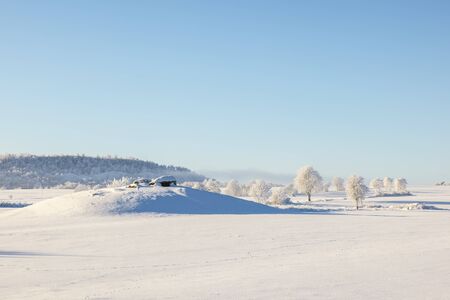 Stone Age grave on a hill in a beautiful winter landscape