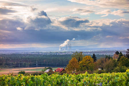 View of the landscape with smoking chimneys from a power plant