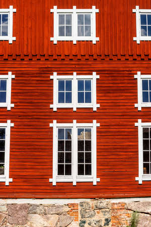 Wooden facade with beautiful windows
