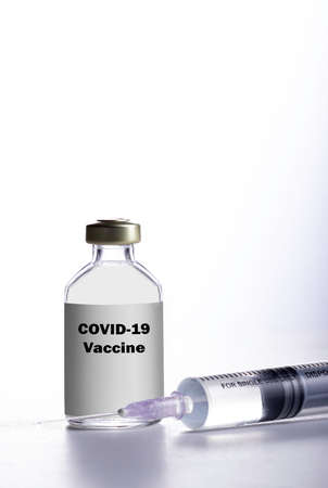 covid 19 vaccine with syringeの写真素材