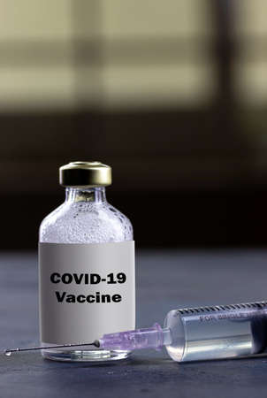 covid 19 vaccine with syringeの写真素材