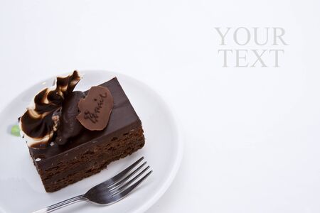 Delicious brownie cake with luxury cream toppingの写真素材