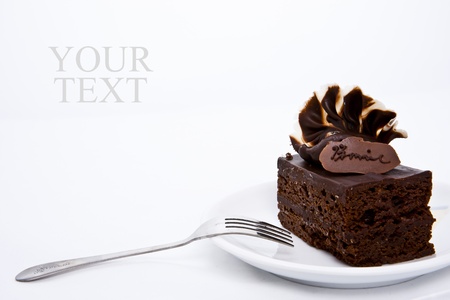 Delicious brownie cake with luxury cream toppingの写真素材