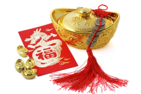 Blossom word with copper coins and gold ingotsの写真素材