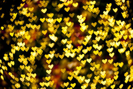 Blurred of heart shape christmas light, Can be used as background の写真素材