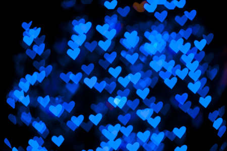Blurred of heart shape christmas light, Can be used as background の写真素材