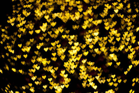 Blurred of heart shape christmas light, Can be used as background の写真素材