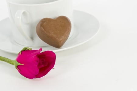 Chocolate heart and rose in the Valentine s Day, white backgroundの写真素材