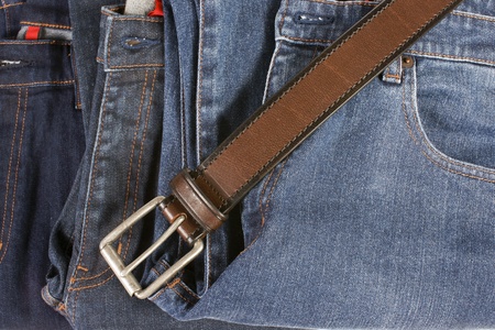 Brown leather belt and blue jean