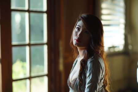 Sexy woman posing in old abandoned house.の写真素材