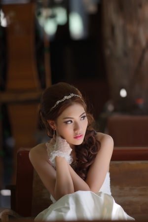 Young Asian lady in white bride dress, Model is Thai Ethnicityの写真素材