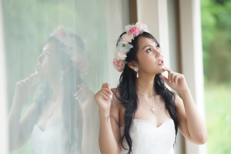 Beautiful Asian lady in white bride dress, Model is Thai Ethnicityの写真素材