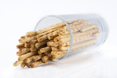 Studio image of salted pretzels in a glass on the white backgroundの写真素材