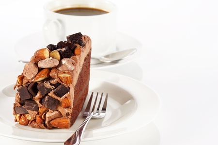 Sweet chocolate cake topping with chocolate and almond nut.の写真素材