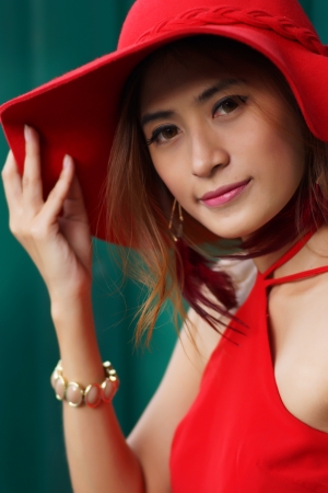 Beautiful young woman posing alone at the outdoor cafe, Model is Thai Ethnicity.の写真素材