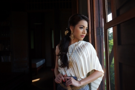 Thai woman wearing typical Thai dress, identity culture of Thailandの写真素材