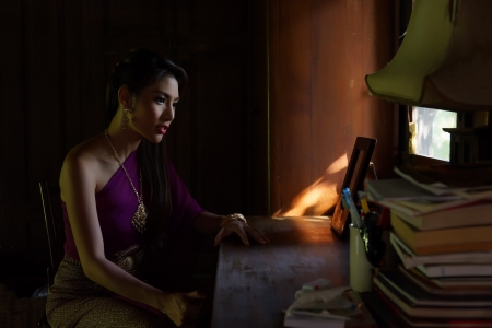 Thai woman wearing typical Thai dress, identity culture of Thailand の写真素材