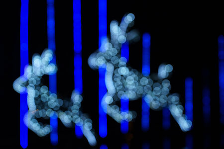 Reindeer Christmas lights as background.の写真素材