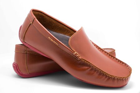 Brown man\'s shoes isolated on white の写真素材