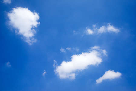 Blue sky background with white clouds.の写真素材