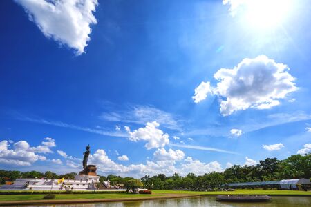 Big Buddha statue at phutthamonthon, Nakhon Pathom, Thailand, on beautiful clouds and blue sky backgroundの写真素材