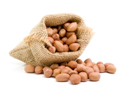 No shell dry peanut in sack, Isolated on white backgroundの写真素材