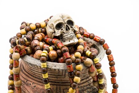 Skull model with Paternoster and pottery.の写真素材