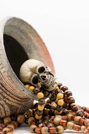 Skull model with Paternoster and pottery.の写真素材
